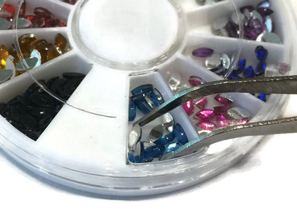 Pinza para aplicacion de cristales